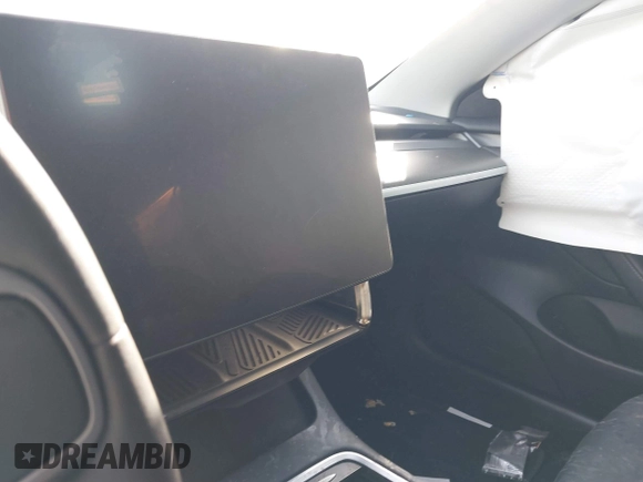 2022 Tesla Model 3 Performance with VIN 5YJ3E1EC3NF194197, listed as a IAAI auction lot 41825401 with Not Provided miles and . Bid and sale history available at DreamBid. Image 15.