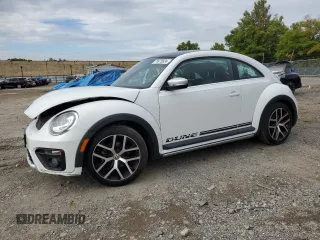 2018 Volkswagen Beetle Dune with VIN 3VWSD7AT1JM706856, listed as a Copart auction lot 71675824 with 119,451 mi miles and Salvage Title. Bid and sale history available at DreamBid. Image 1.