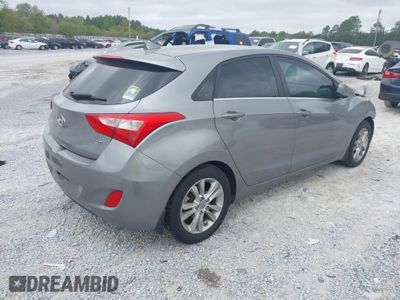 2013 Hyundai Elantra GT with VIN KMHD35LE8DU033254, listed as a IAAI auction lot 41956469 with 98,484 mi miles. Bid and sale history available at carsss.com. Image 4.