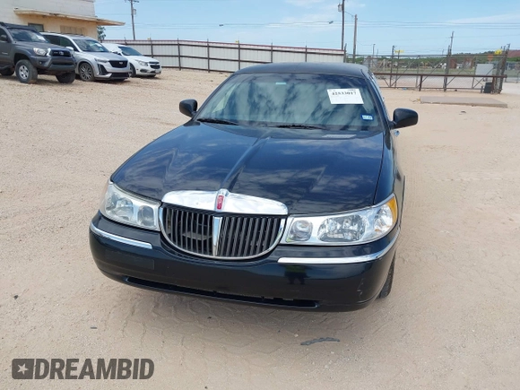 2000 Lincoln Town Car Executive with VIN 1L1FM81W7YY853277, listed as a IAAI auction lot 42533017 with 182,410 mi miles and . Bid and sale history available at DreamBid. Image 6.
