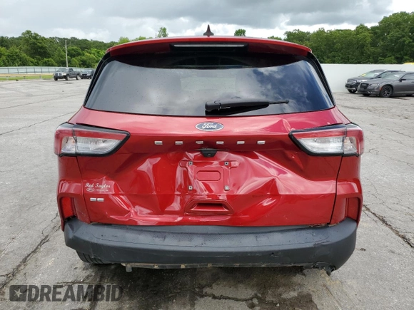 2021 Ford Escape SE with VIN 1FMCU0G67MUA28996, listed as a Copart auction lot 60305015 with 64,013 mi miles and Salvage title. Bid and sale history available at DreamBid. Image 6.