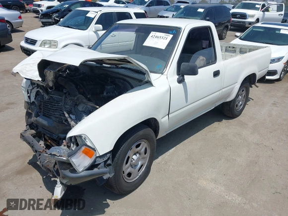 1992 Toyota Pickup z VIN JT4RN81A0N0090921, wystawiony jako IAAI lot #42465321 z przebiegiem 166 211 mil mil oraz . Historia ofert i sprzedaży dostępna na DreamBid. Obrazek 2.