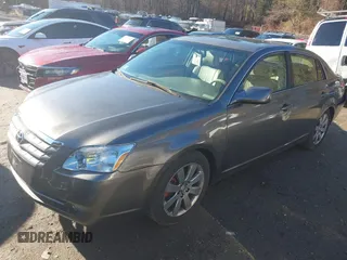 2006 Toyota Avalon XL with VIN 4T1BK36B26U167230, listed as a IAAI auction lot 41063606 with 198,694 mi miles. Bid and sale history available at carsss.com. Image 2.