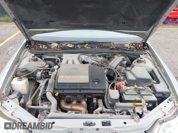 2003 Toyota Avalon XL z VIN 4T1BF28B13U293991, wystawiony jako IAAI lot #42358965 z przebiegiem 142 424 mil mil oraz . Historia ofert i sprzedaży dostępna na DreamBid. Obrazek 10.