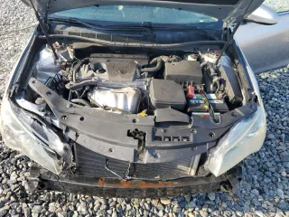 2015 Toyota Camry XLE z VIN 4T1BF1FK6FU058827, wystawiony jako Copart lot #56230185 z przebiegiem 202 052 mil mil oraz Szkoda całkowita • Salvage title. Historia ofert i sprzedaży dostępna na DreamBid. Obrazek 11.