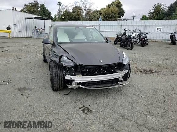 2024 Tesla Model Y Performance with VIN 7SAYGDEF7RF093054, listed as a Copart auction lot 50747985 with 26,907 mi miles and Salvage Title. Bid and sale history available at DreamBid. Image 10.