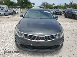 2016 Kia Optima EX z VIN 5XXGU4L32GG006195, wystawiony jako Copart lot #59544165 z przebiegiem 70 116 mil mil oraz Szkoda całkowita • Salvage title. Historia ofert i sprzedaży dostępna na DreamBid. Obrazek 5.