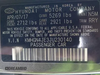 2018 Genesis G80 3.8L with VIN KMHGN4JE3JU230140, listed as a IAAI auction lot 41699214 with 35,864 mi miles. Bid and sale history available at carsss.com. Image 9.