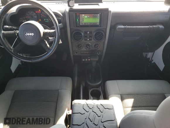 2008 Jeep Wrangler Unlimited X with VIN 1J4GB39128L576571, listed as a Copart auction lot 52706105 with 197,655 mi miles and Clean Title. Bid and sale history available at DreamBid. Image 8.