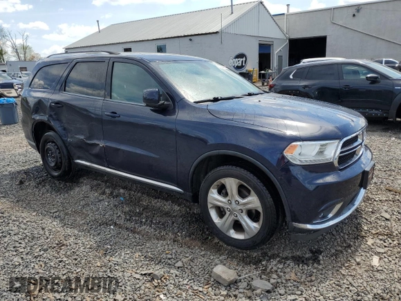 2014 Dodge Durango Limited with VIN 1C4RDJDG2EC549102, listed as a Copart auction lot 53894805 with 97,052 mi miles and Salvage title. Bid and sale history available at DreamBid. Image 4.