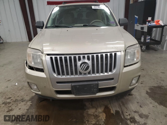 2010 Mercury Mariner z VIN 4M2CN9BG1AKJ04266, wystawiony jako Copart lot #43746595 z przebiegiem Nie podano mil oraz Szkoda całkowita • Salvage title. Historia ofert i sprzedaży dostępna na DreamBid. Obrazek 5.