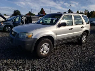 2007 Ford Escape XLS with VIN 1FMYU92Z97KA43155, listed as a Copart auction lot 75567154 with 240,603 mi miles and Salvage title. Bid and sale history available at DreamBid. Image 1.