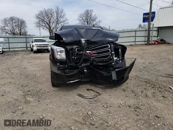 2019 GMC Yukon SLT Standard Edition with VIN 1GKS2DKC4KR393344, listed as a Copart auction lot 51942674 with 76,147 mi miles. Bid and sale history available at carsss.com. Image 12.