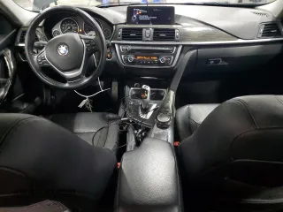 2015 BMW 3 Series 328i xDrive with VIN WBA3B3C50FJ984086, listed as a Copart auction lot 52006475 with 147,065 mi miles and Salvage Title. Bid and sale history available at carsss.com. Image 8.