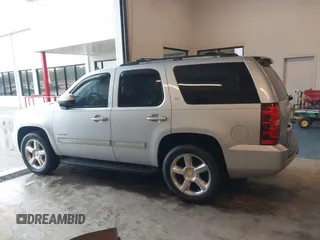 2010 Chevrolet Tahoe LT with VIN 1GNMCBE35AR114622, listed as a IAAI auction lot 41974795 with 248,109 mi miles and . Bid and sale history available at DreamBid. Image 14.
