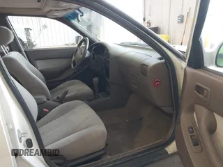 1996 Toyota Camry DX with VIN JT2BG12K3T0401659, listed as a IAAI auction lot 41874795 with 169,406 mi miles. Bid and sale history available at carsss.com. Image 5.
