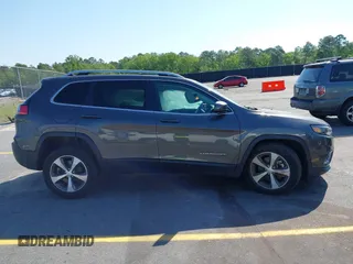 2021 Jeep Cherokee Limited z VIN 1C4PJMDX6MD209395, wystawiony jako IAAI lot #42073746 z przebiegiem 26 627 mil mil oraz . Historia ofert i sprzedaży dostępna na DreamBid. Obrazek 13.