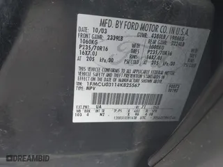 2004 Ford Escape XLT with VIN 1FMCU03114KB25567, listed as a IAAI auction lot 41559575 with 238,685 mi miles. Bid and sale history available at carsss.com. Image 9.