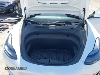 2023 Tesla Model 3 with VIN 5YJ3E1EA7PF592966, listed as a IAAI auction lot 41879794 with 13,423 mi miles and . Bid and sale history available at carsss.com. Image 10.