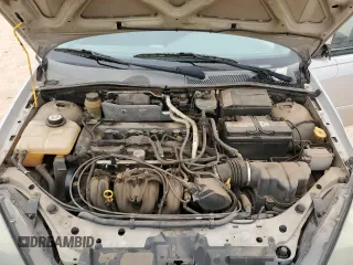 2004 Ford Focus with VIN 3FAFP37Z14R102723, listed as a Copart auction lot 44138195 with 220,354 mi miles and Salvage title. Bid and sale history available at DreamBid. Image 11.