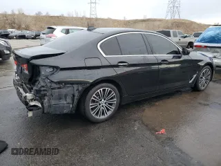 2018 BMW 5 Series 530e xDrive with VIN WBAJB1C5XJB084018, listed as a Copart auction lot 86277124 with 127,517 mi miles and Salvage Title. Bid and sale history available at carsss.com. Image 3.