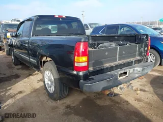 1999 Chevrolet Silverado 1500 LS with VIN 2GCEC19T4X1165256, listed as a IAAI auction lot 41236272 with 77,004 mi miles. Bid and sale history available at carsss.com. Image 3.