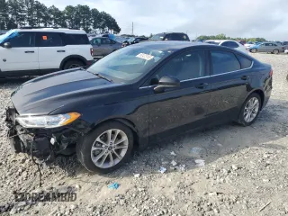 2020 Ford Fusion SE z VIN 3FA6P0LU0LR160068, wystawiony jako Copart lot #60423155 z przebiegiem 53 627 mil mil oraz Szkoda całkowita • Salvage title. Historia ofert i sprzedaży dostępna na DreamBid. Obrazek 1.