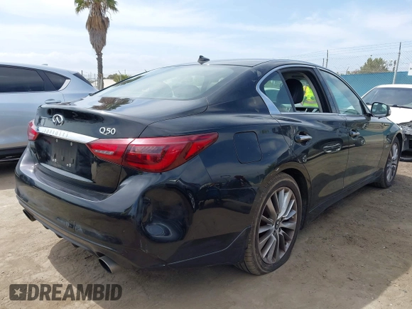 2019 Infiniti Q50 Luxe with VIN JN1EV7AP9KM543079, listed as a IAAI auction lot 42244113 with 36,291 mi miles and . Bid and sale history available at DreamBid. Image 4.