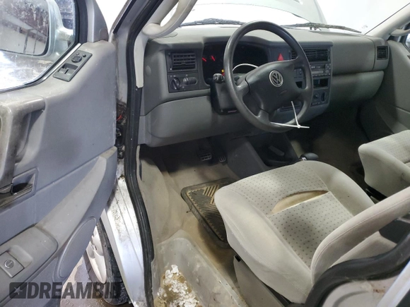 2003 Volkswagen EuroVan MV с VIN WV2NB47073H001005, выставлен на аукционе Copart как лот 87284844 с пробегом 283 979 миль миль и Чистый • Clean title. История ставок и продаж доступна на DreamBid. Изображение 8.