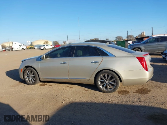 2014 Cadillac XTS with VIN 2G61L5S30E9207777, listed as a IAAI auction lot 41202654 with 112,565 mi miles. Bid and sale history available at carsss.com. Image 14.