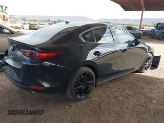 2023 Mazda 3 Premium Plus with VIN 3MZBPBEY6PM350056, listed as a IAAI auction lot 41940111 with 27,091 mi miles and . Bid and sale history available at DreamBid. Image 4.