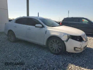 2012 Lincoln MKS with VIN 1LNHL9DR1CG805164, listed as a Copart auction lot 48375595 with 104,246 mi miles and Salvage Title. Bid and sale history available at carsss.com. Image 4.