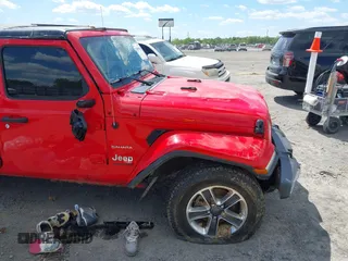 2018 Jeep Wrangler Unlimited Sahara with VIN 1C4HJXEG6JW174359, listed as a IAAI auction lot 42009968 with 79,830 mi miles and . Bid and sale history available at DreamBid. Image 18.