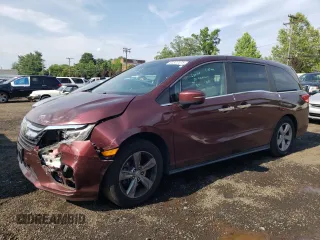 2018 Honda Odyssey EX z VIN 5FNRL6H55JB037386, wystawiony jako Copart lot #63577475 z przebiegiem 125 498 mil mil oraz Szkoda całkowita • Salvage title. Historia ofert i sprzedaży dostępna na DreamBid. Obrazek 1.