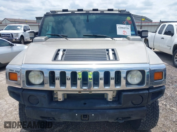 2003 Hummer H2 with VIN 5GRGN23U23H148326, listed as a IAAI auction lot 42068326 with 149,396 mi miles. Bid and sale history available at carsss.com. Image 12.