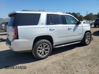 2016 GMC Yukon SLT with VIN 1GKS1BKC4GR138658, listed as a Copart auction lot 76634664 with 132,358 mi miles and Salvage Title. Bid and sale history available at carsss.com. Image 3.