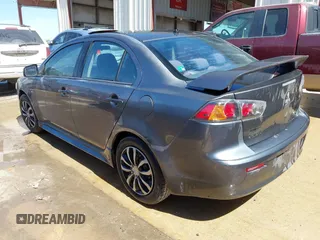 2010 Mitsubishi Lancer DE with VIN JA32U1FU1AU033241, listed as a IAAI auction lot 41805976 with 214,606 mi miles. Bid and sale history available at carsss.com. Image 3.