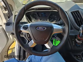 2016 Ford Transit Cargo z VIN 1FTYE1YM9GKB15647, wystawiony jako IAAI lot #42575776 z przebiegiem 235 520 mil mil oraz . Historia ofert i sprzedaży dostępna na DreamBid. Obrazek 25.