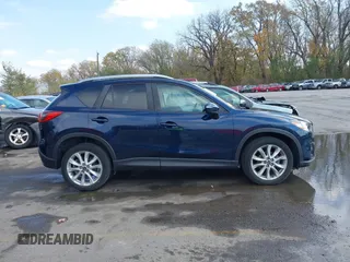 2015 Mazda CX-5 Grand Touring with VIN JM3KE4DY7F0478823, listed as a IAAI auction lot 40731626 with 82,884 mi miles. Bid and sale history available at carsss.com. Image 13.