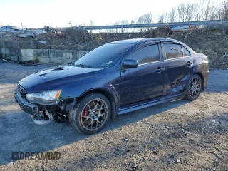 2014 Mitsubishi Lancer Evolution MR with VIN JA32W5FV8EU014461, listed as a Copart auction lot 87376384 with 0 mi miles and Salvage Title. Bid and sale history available at carsss.com. Image 1.