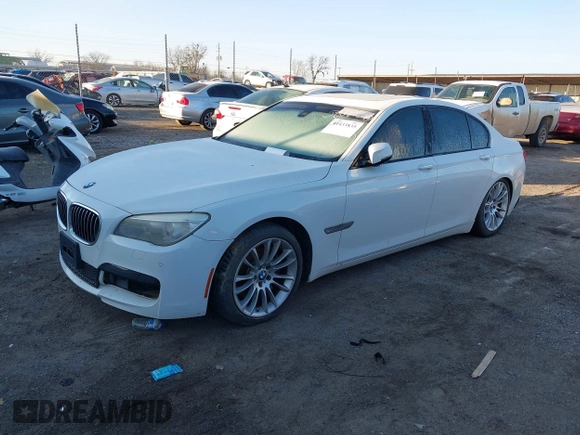 2013 BMW 7 Series 740i with VIN WBAYA6C54DD143796, listed as a IAAI auction lot 41433835 with 1 mi miles. Bid and sale history available at carsss.com. Image 2.