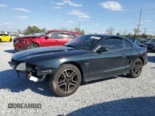 1998 Ford Mustang GT z VIN 1FAFP42X7WF230542, wystawiony jako Copart lot #47404255 z przebiegiem 132 586 mil mil oraz Szkoda całkowita • Salvage title. Historia ofert i sprzedaży dostępna na DreamBid. Obrazek 1.