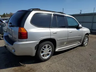 2006 GMC Envoy Denali with VIN 1GKET63M262299491, listed as a Copart auction lot 51914015 with 136,324 mi miles and Salvage Title. Bid and sale history available at carsss.com. Image 3.