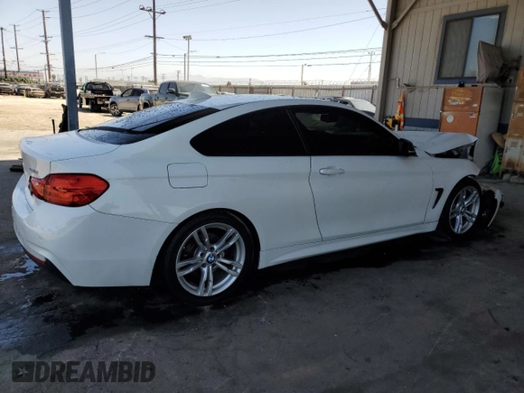 2014 BMW 4 Series 428i with VIN WBA3N3C57EF711803, listed as a Copart auction lot 57856695 with 68,905 mi miles and Salvage title. Bid and sale history available at DreamBid. Image 3.