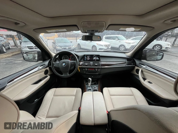 2011 BMW X5 35i with VIN 5UXZV4C58BL401755, listed as a Copart auction lot 49190535 with 104,082 mi miles and Clean Title. Bid and sale history available at carsss.com. Image 9.