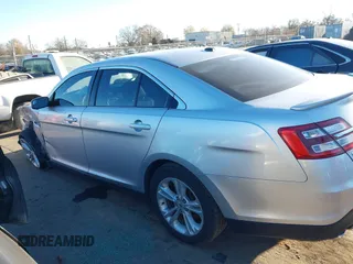 2014 Ford Taurus SEL z VIN 1FAHP2E87EG121069, wystawiony jako IAAI lot #41030422 z przebiegiem 138 043 mil mil oraz . Historia ofert i sprzedaży dostępna na DreamBid. Obrazek 14.