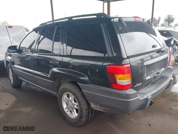 2004 Jeep Grand Cherokee Laredo with VIN 1J4GX48N94C435700, listed as a IAAI auction lot 41809624 with 147,413 mi miles. Bid and sale history available at carsss.com. Image 3.