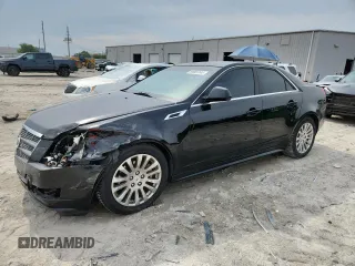 2011 Cadillac CTS Premium with VIN 1G6DP5ED1B0128341, listed as a Copart auction lot 64007145 with 141,505 mi miles and Salvage title. Bid and sale history available at DreamBid. Image 1.
