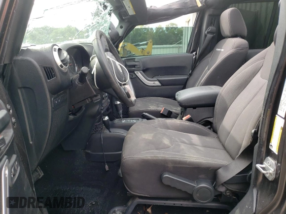 2016 Jeep Wrangler Unlimited Rubicon Hard Rock with VIN 1C4BJWFG4GL188382, listed as a Copart auction lot 60615403 with 39,629 mi miles and Salvage Title. Bid and sale history available at carsss.com. Image 7.