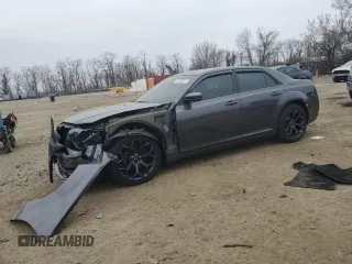 2019 Chrysler 300 S z VIN 2C3CCABG8KH594943, wystawiony jako Copart lot #49223225 z przebiegiem 60 893 mil mil oraz Szkody całkowita. Historia ofert i sprzedaży dostępna na DreamBid. Obrazek 1.